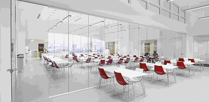 Full-height frameless interior glass doors partitioning a bright office meeting room